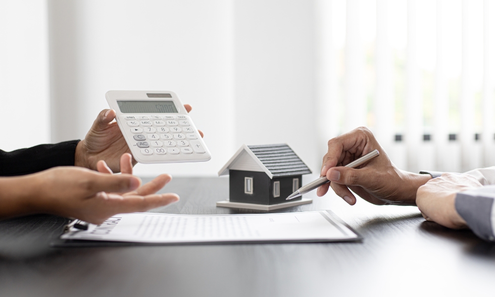Senior homeowner in Houston reviewing home insurance documents with a calm living room background